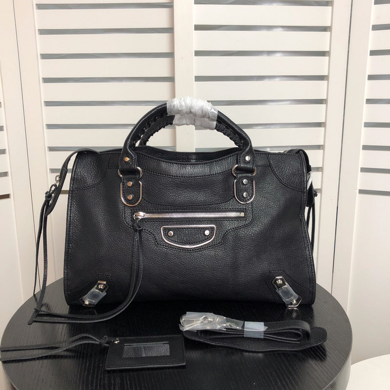 Side profile of modern refined women's handbag – women's luxury handbag