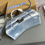 Styled lifestyle shot of premium sleek women's handbag – women's everyday handbag