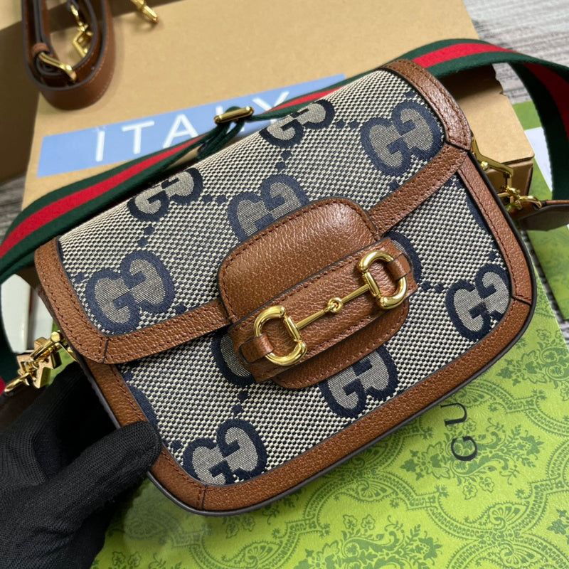 Back view of signature modern women's handbag – women's statement bag