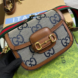 Back view of signature modern women's handbag – women's statement bag