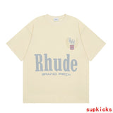 Back view of Rhude luxury clothing with signature branding