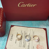Side view of Cartier unisex jewelry piece