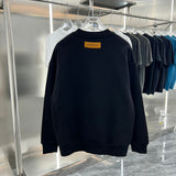 Side profile of Louis Vuitton luxury clothing with relaxed-fit cut