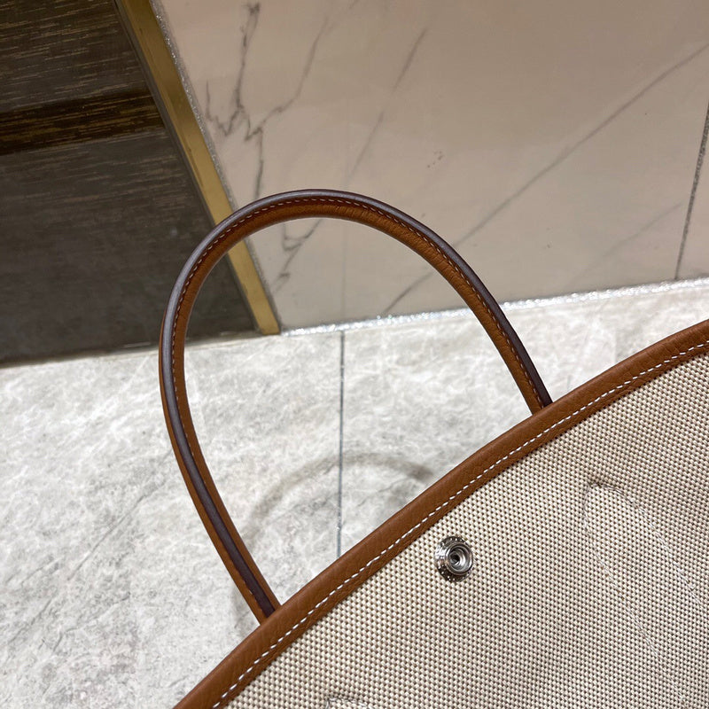 Side view of refined structured handbag