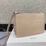 Side profile of statement chic women's handbag – women's everyday handbag