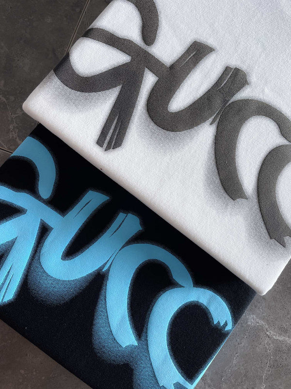 Side profile of Gucci luxury clothing with monogram-inspired silhouette