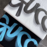 Side profile of Gucci luxury clothing with monogram-inspired silhouette