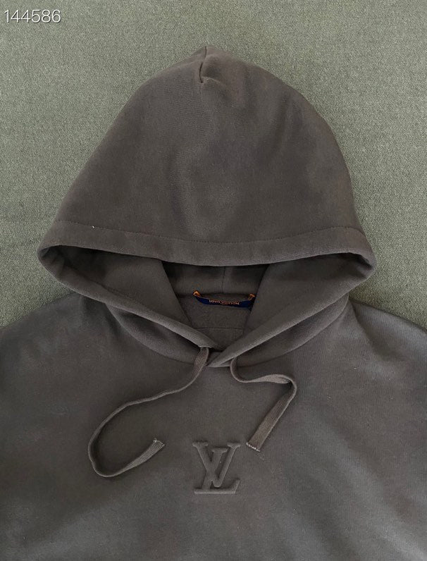 Back view of Louis Vuitton luxury clothing with everyday silhouette