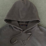 Back view of Louis Vuitton luxury clothing with everyday silhouette
