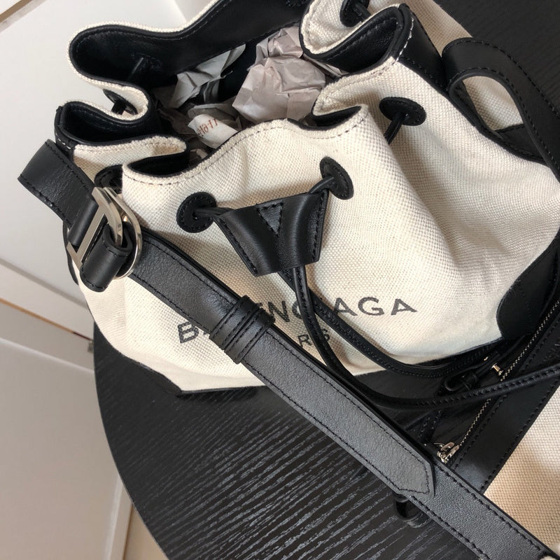 Styled lifestyle shot of statement structured women's handbag – women's luxury accessory