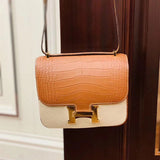 Side view of refined structured handbag