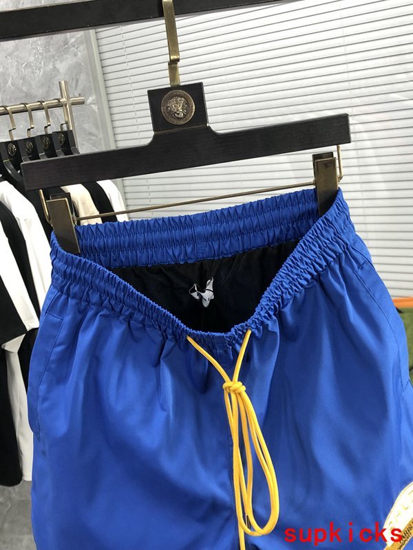 Side profile of Rhude luxury clothing with streetwear-inspired cut