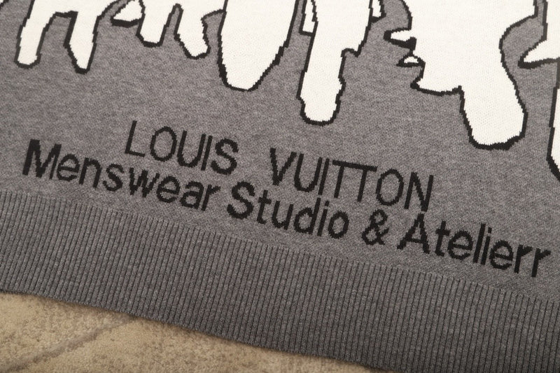 Close-up detail shot of Louis Vuitton luxury clothing with logo-detail design