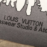 Close-up detail shot of Louis Vuitton luxury clothing with logo-detail design