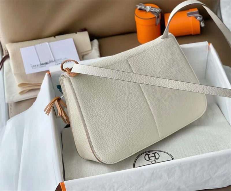 Streamlined shopper bag carried on shoulder 34