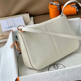 Streamlined shopper bag carried on shoulder 34