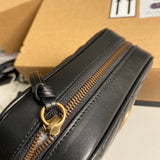 Styled lifestyle shot of structured signature women's handbag – women's statement bag