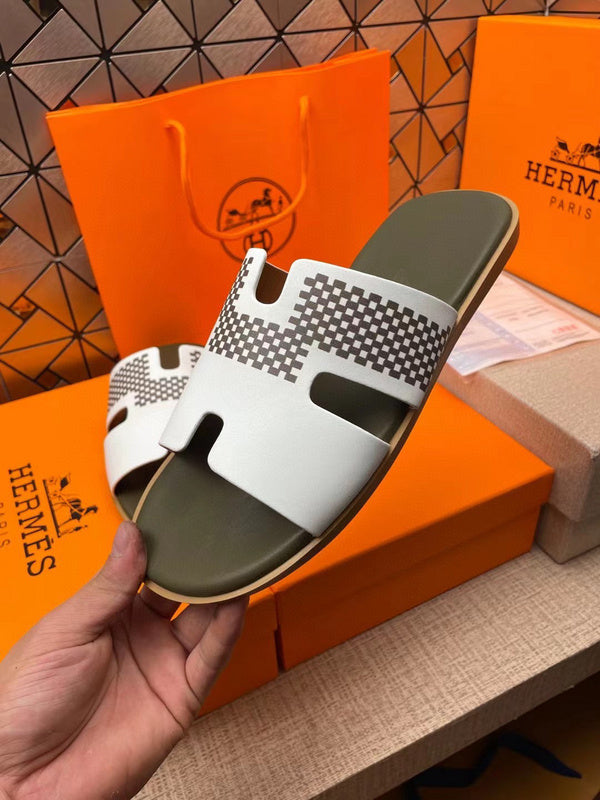 Hermès Tan Slip-On Sneakers - Sole Detail View