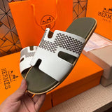 Hermès Tan Slip-On Sneakers - Sole Detail View