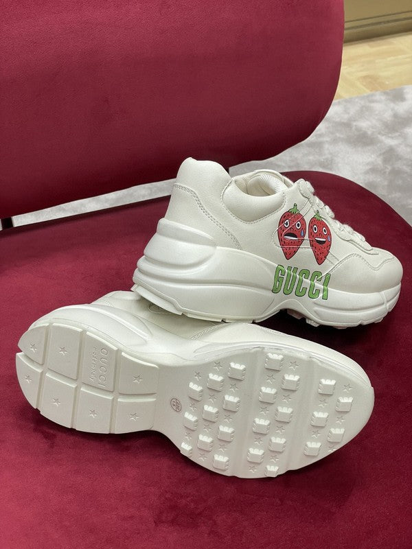 Side profile of Gucci soft grey sneakers bold athletic profile
