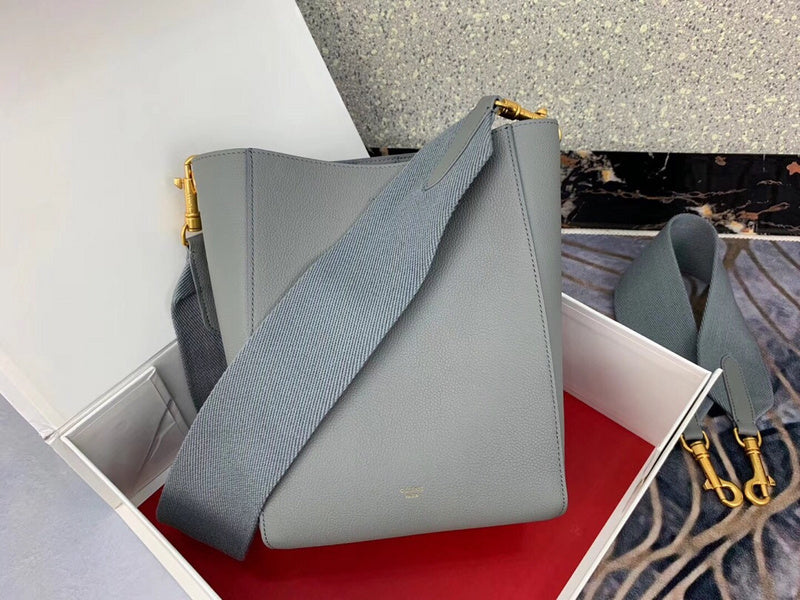 Side profile of elevated signature women's handbag – women's luxury handbag
