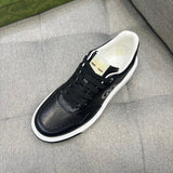 Side profile of Gucci neutral cream sneakers signature lace-up style