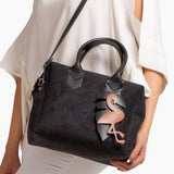 Ziva's Charm crossbody bag – side angle view (one versatile size)