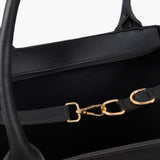 Ziva's Charm shoulder bag – carry view (one versatile size)