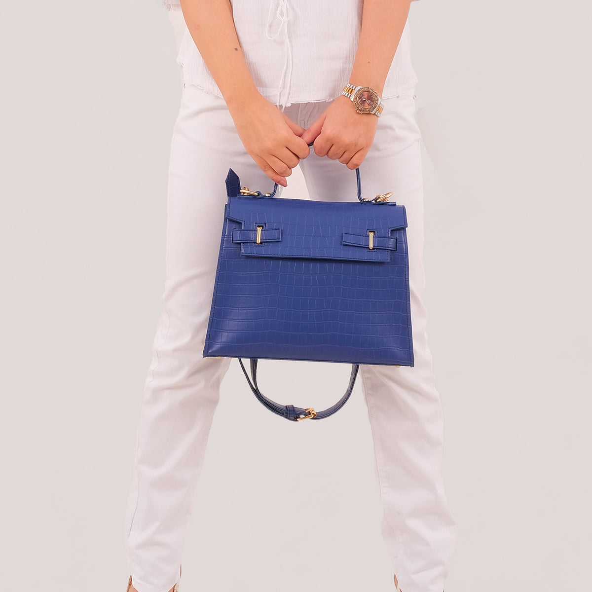 Ziva's Charm crossbody bag – side angle view (one versatile size)