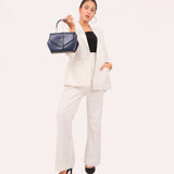 Ziva's Charm shoulder bag – carry view (one versatile size)