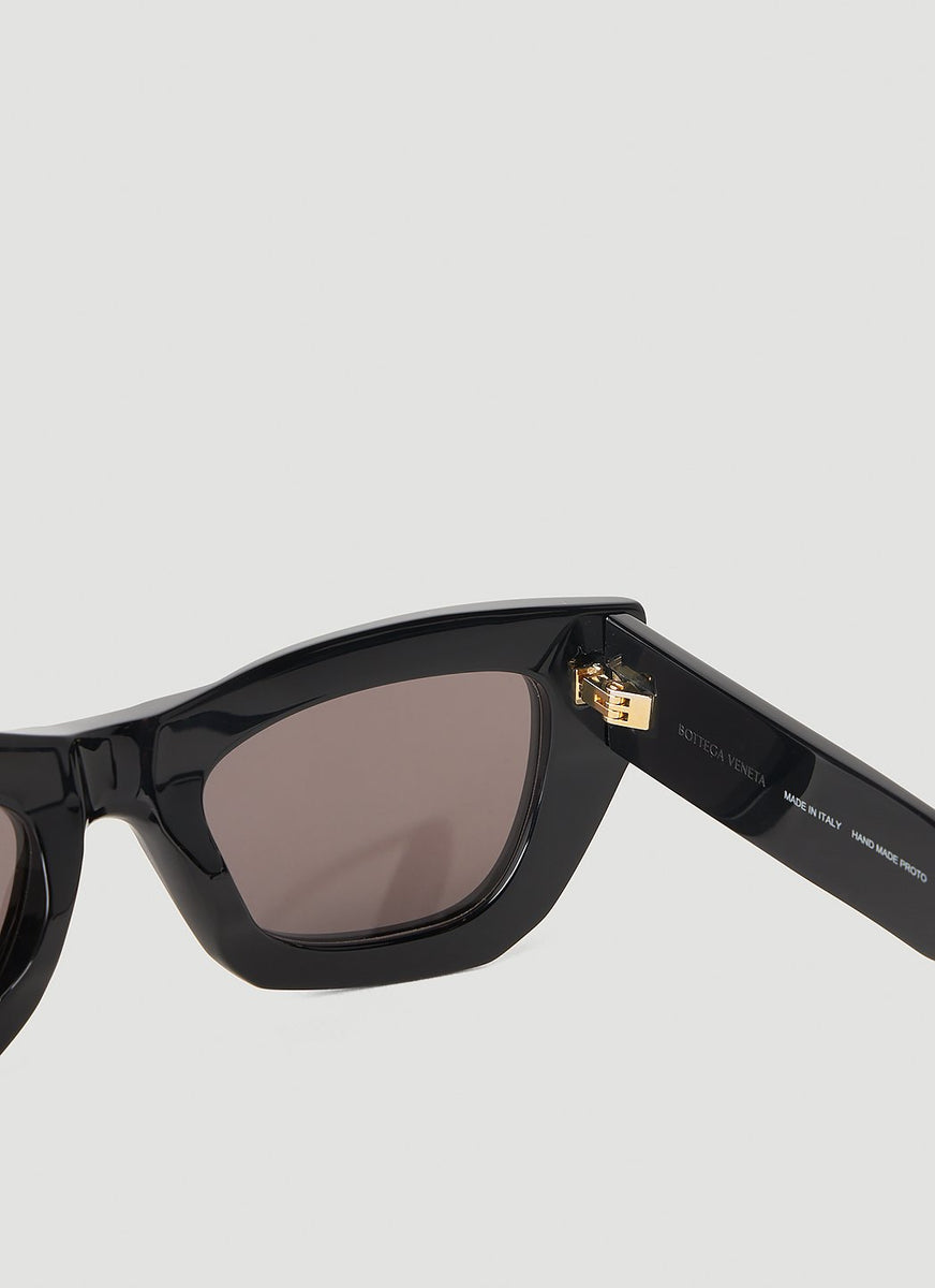 Close-up of Bottega Veneta sunglasses hardware and fine stitching