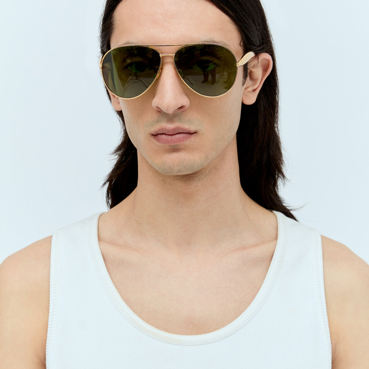 Close-up of Bottega Veneta sunglasses hardware and fine stitching