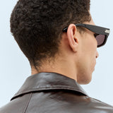 Bottega Veneta sunglasses lifestyle shot premium designer piece