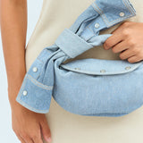 Close-up of Bottega Veneta shoulder bags hardware and fine stitching
