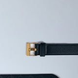 Close-up of Bottega Veneta belts hardware and fine stitching