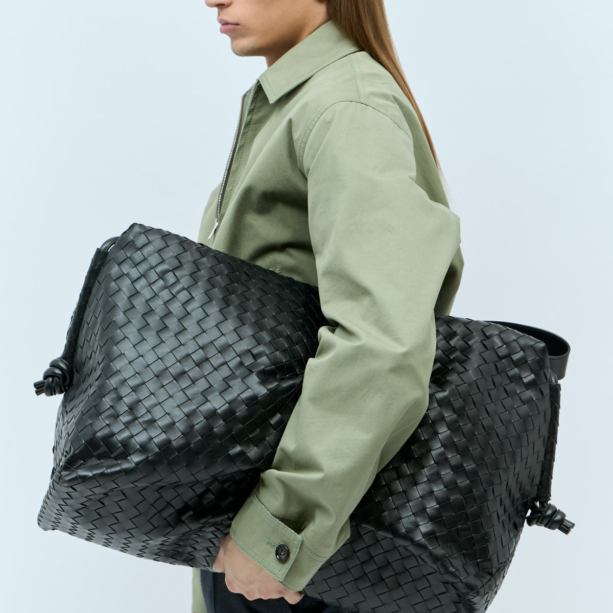 Close-up of Bottega Veneta weekend/travel bags hardware and fine stitching