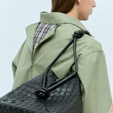Bottega Veneta weekend/travel bags lifestyle shot premium designer piece