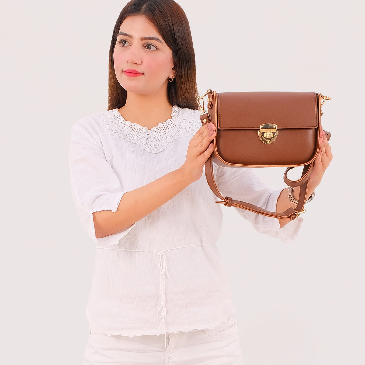 Ziva's Charm crossbody bag – side angle view (one versatile size)