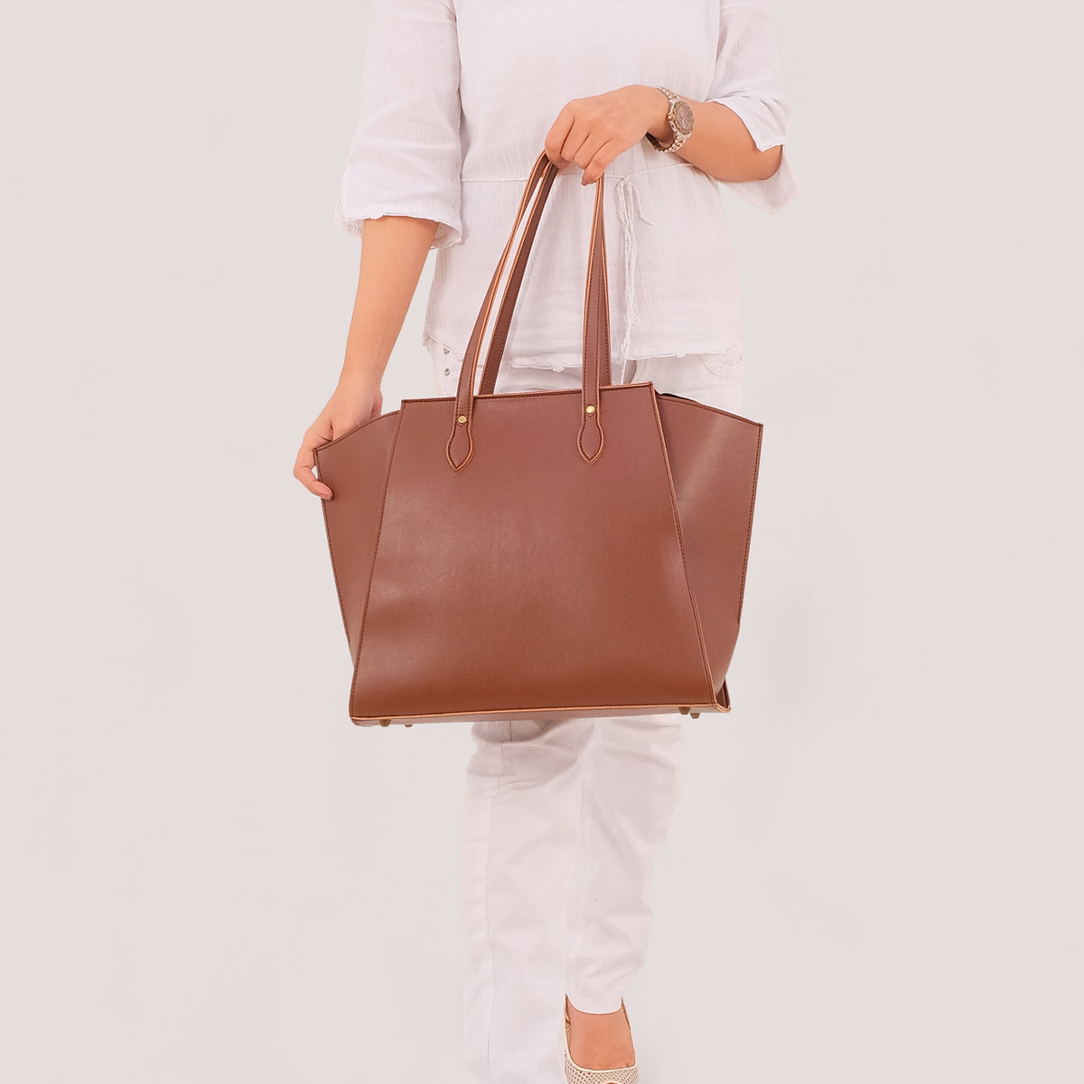 Ziva's Charm shoulder bag – side angle view (one versatile size)