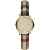 Front view of Burberry women's gold watch