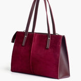 Ziva's Charm shoulder bag – side angle view (one versatile size)