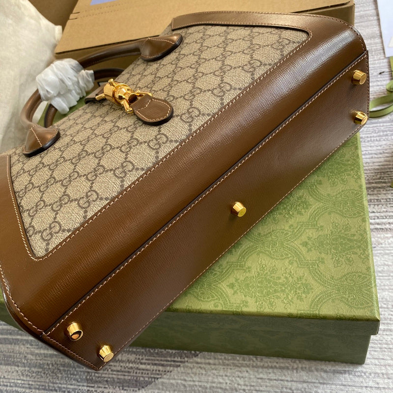 Handle and strap detail of polished everyday-luxe women's handbag – women's luxury accessory