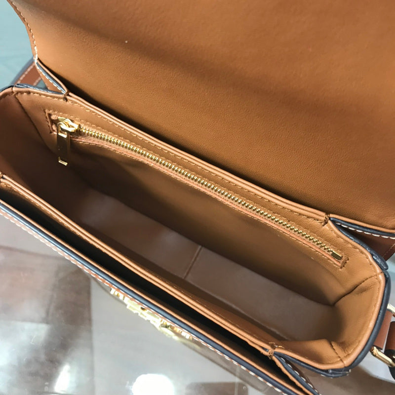 Back view of modern premium women's handbag – women's luxury accessory
