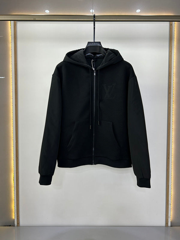 Front view of Louis Vuitton luxury clothing with label-forward styling