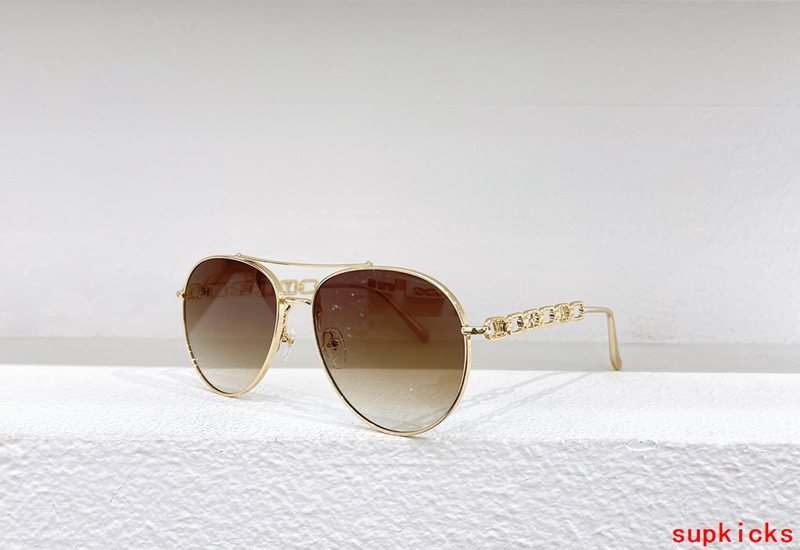 Close-up detail view of Louis Vuitton unisex sunglasses