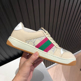 Gucci two-tone luxury sneakers view 10 signature lace-up style