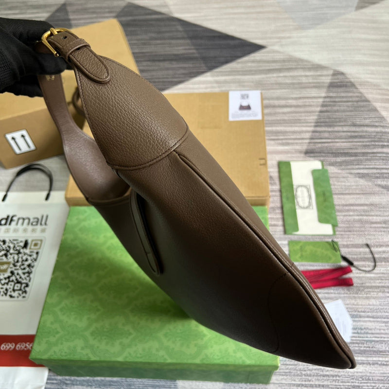 Side view of sleek structured handbag
