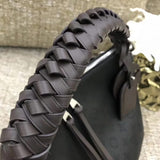 Styled lifestyle shot of polished sleek women's handbag – women's luxury accessory
