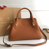 Ziva's Charm handbag – side angle view (one versatile size)