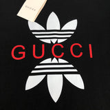 Flat lay presentation of Gucci luxury clothing with relaxed-fit cut